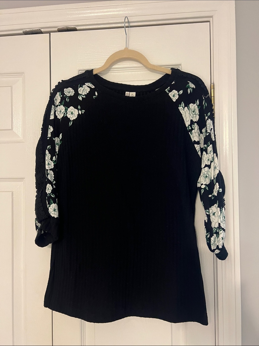 Cato Black Top with White and Green Floral Raglan Sleeves